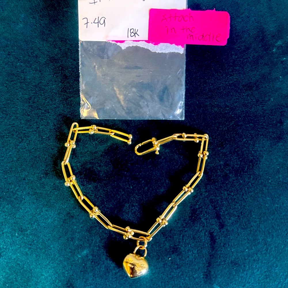 18k Gold bracelet with tiffany charm